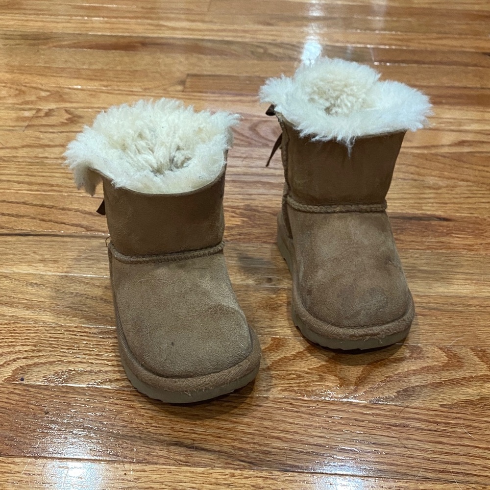 UGG Cream Shearling Boots with bow on the back